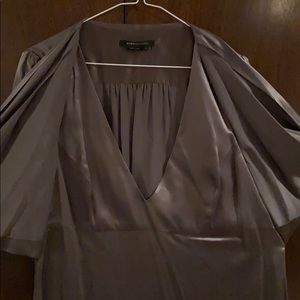 Mid-thigh, silky satin fine material, nice quality